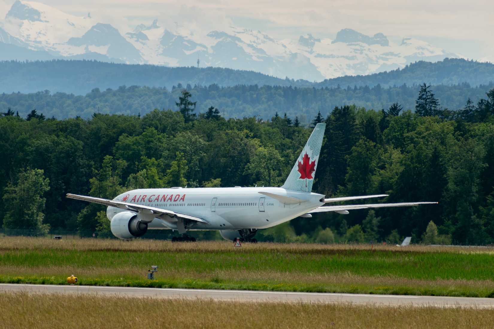 Air Canada Boeing 777-233LR aircraft is lining up on runway 16.