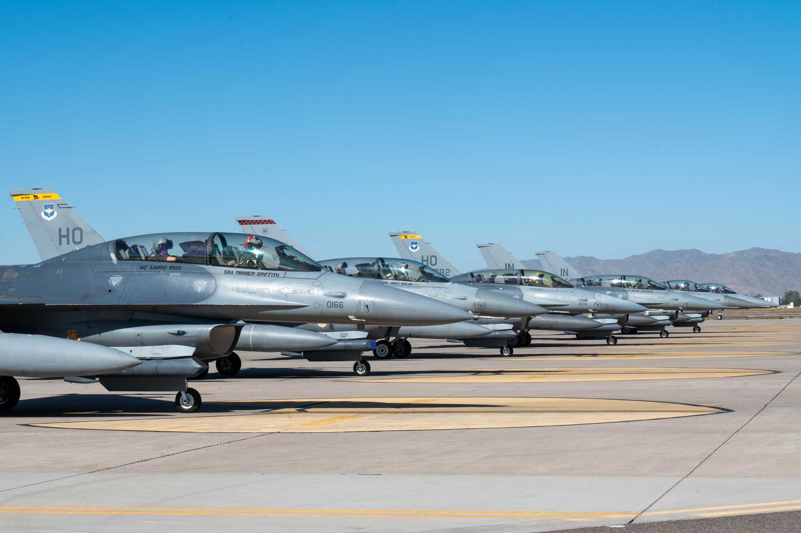 Air Force F-16 Fighting Falcon aircraft assigned to the 309th Fighter Squadron hold formation before takeoff, May 7, 2024, at Luke Air Force Base, Arizona.
