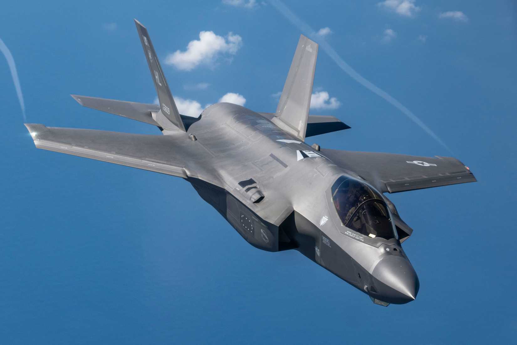 Air Force F-35A Lightning II assigned to the 421st Fighter Squadron flies over the Pacific Ocean.