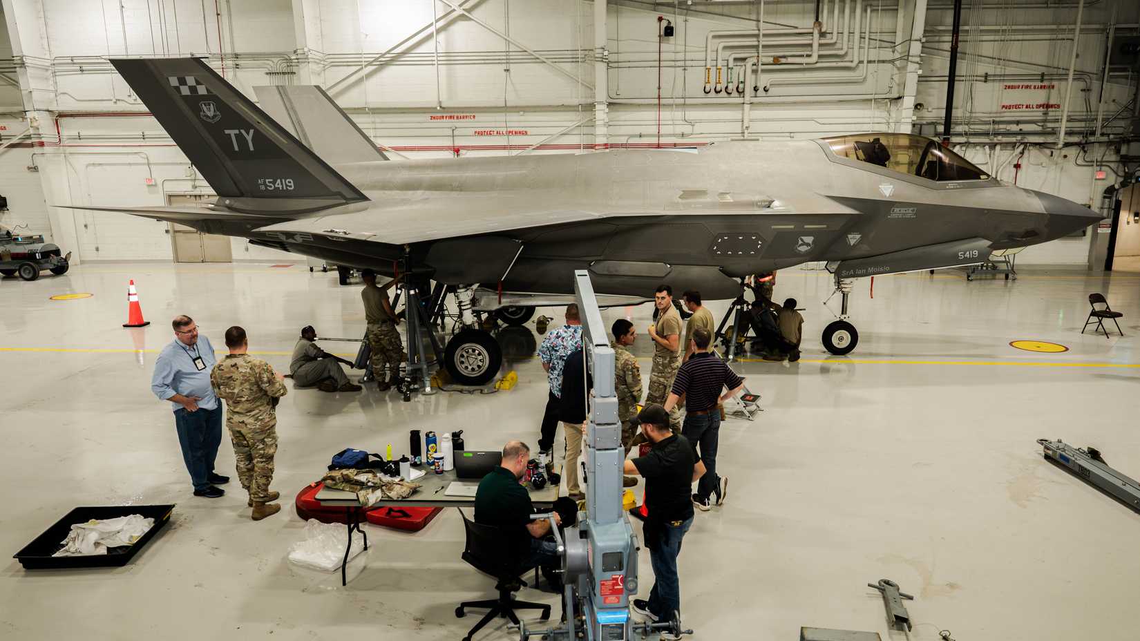 Airmen and Lockheed Martin personnel conduct load cell testing on an F-35A Lightning II at Tyndall Air Force Base.