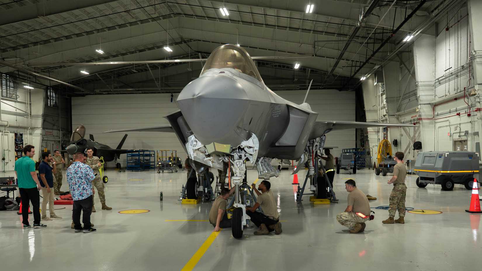 Airmen and Lockheed Martin personnel conduct load testing on an F-35A Lightning II.