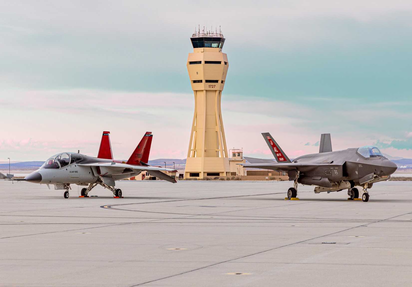 An Edwards AFB T-7A Red Hawk 21-7002 assigned to the 416th Flight Test Squadron and Alabama Air National Guard F-35A 20-5628 assigned to the 100th Fighter Squadron.