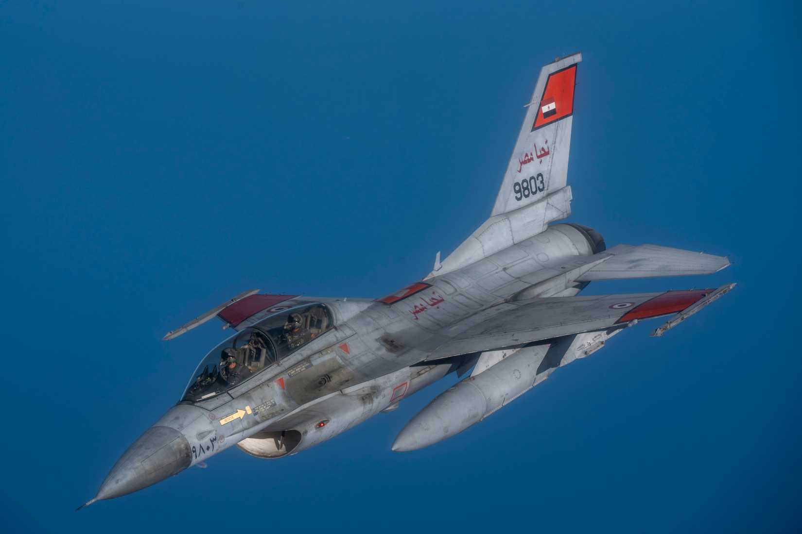 An Egyptian F-16 Fighting Falcon departs after refueling from a USAF KC-135 Stratotanker