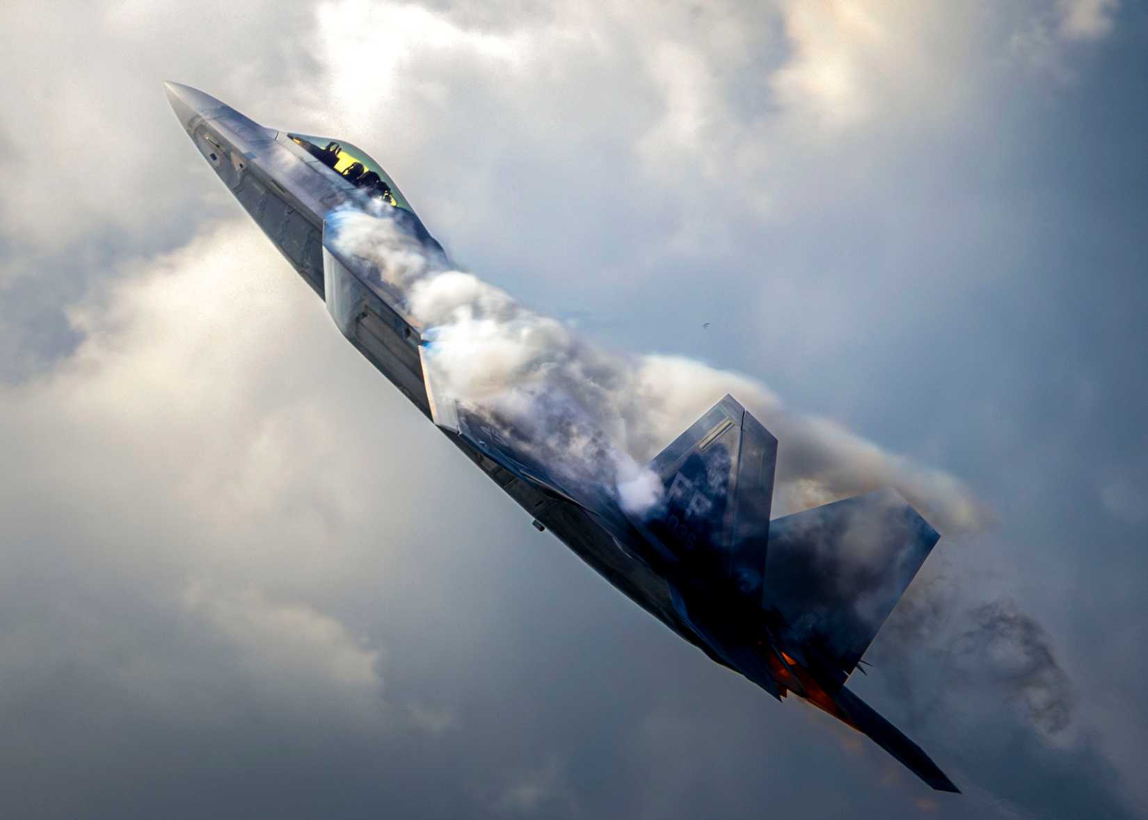 An F-22 Raptor performs an aerial demonstration at Naval Air Station Oceana, Virginia.