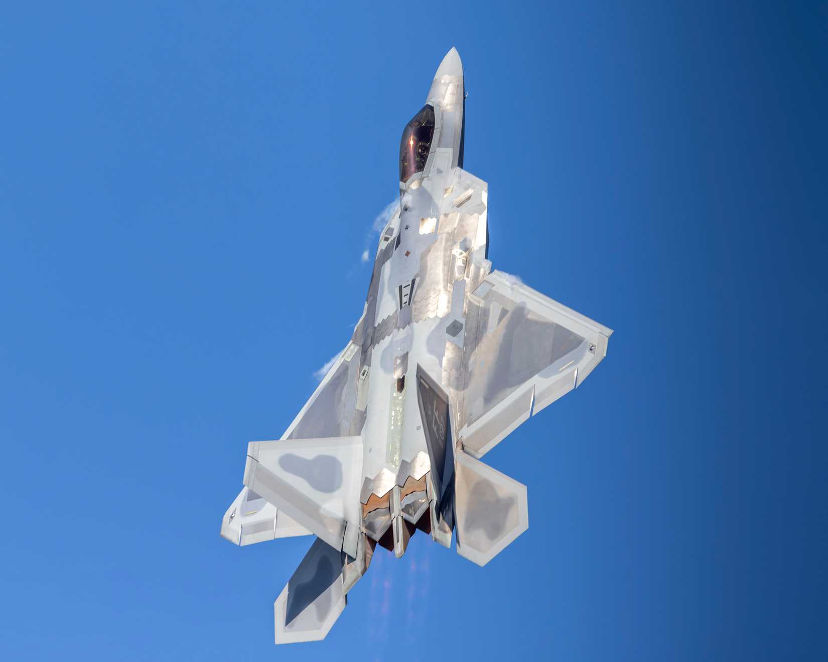 An F-22 Raptor performs an aerial demonstration.