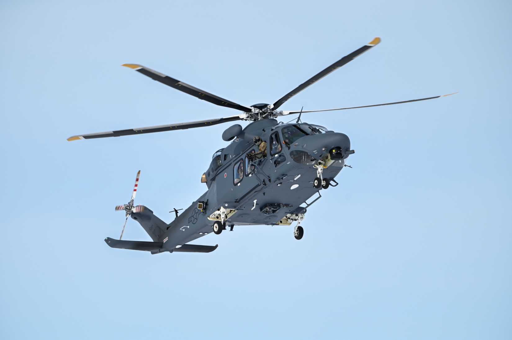 An MH-139A Grey Wolf helicopter assigned to the 550th Helicopter Squadron flies above a simulated nuclear launch facility.