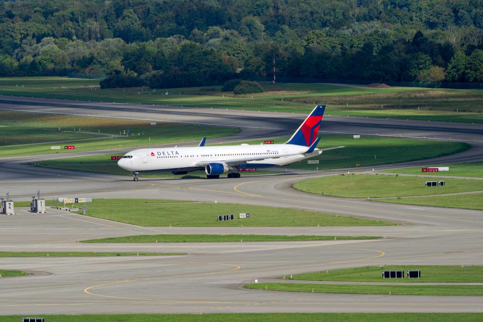 Boeing 767-332ER registration N198DN at Swiss Zurich Airport.