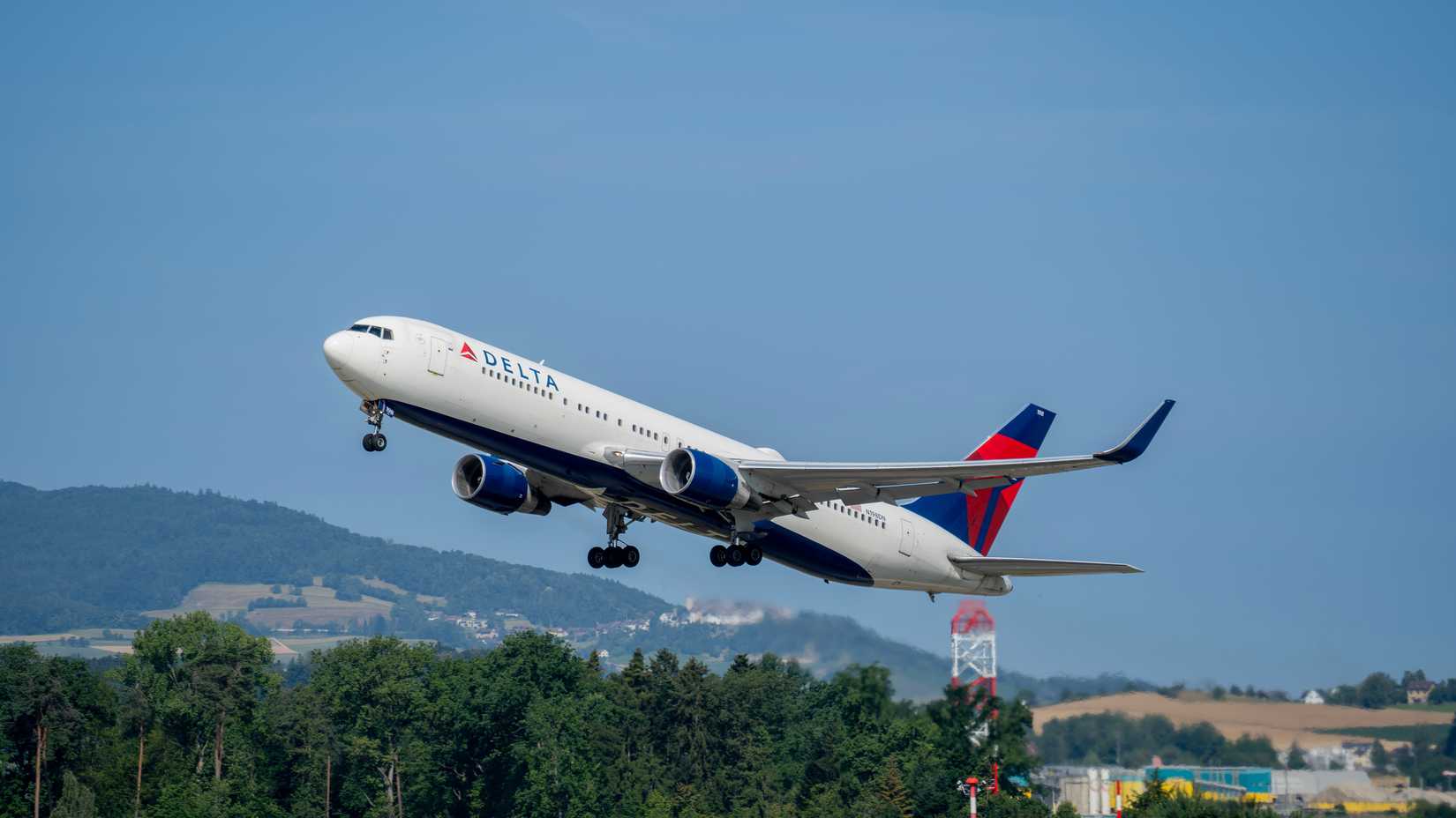Boeing 767 Delta Airlines take-offs at ZRH Zurich international airport.