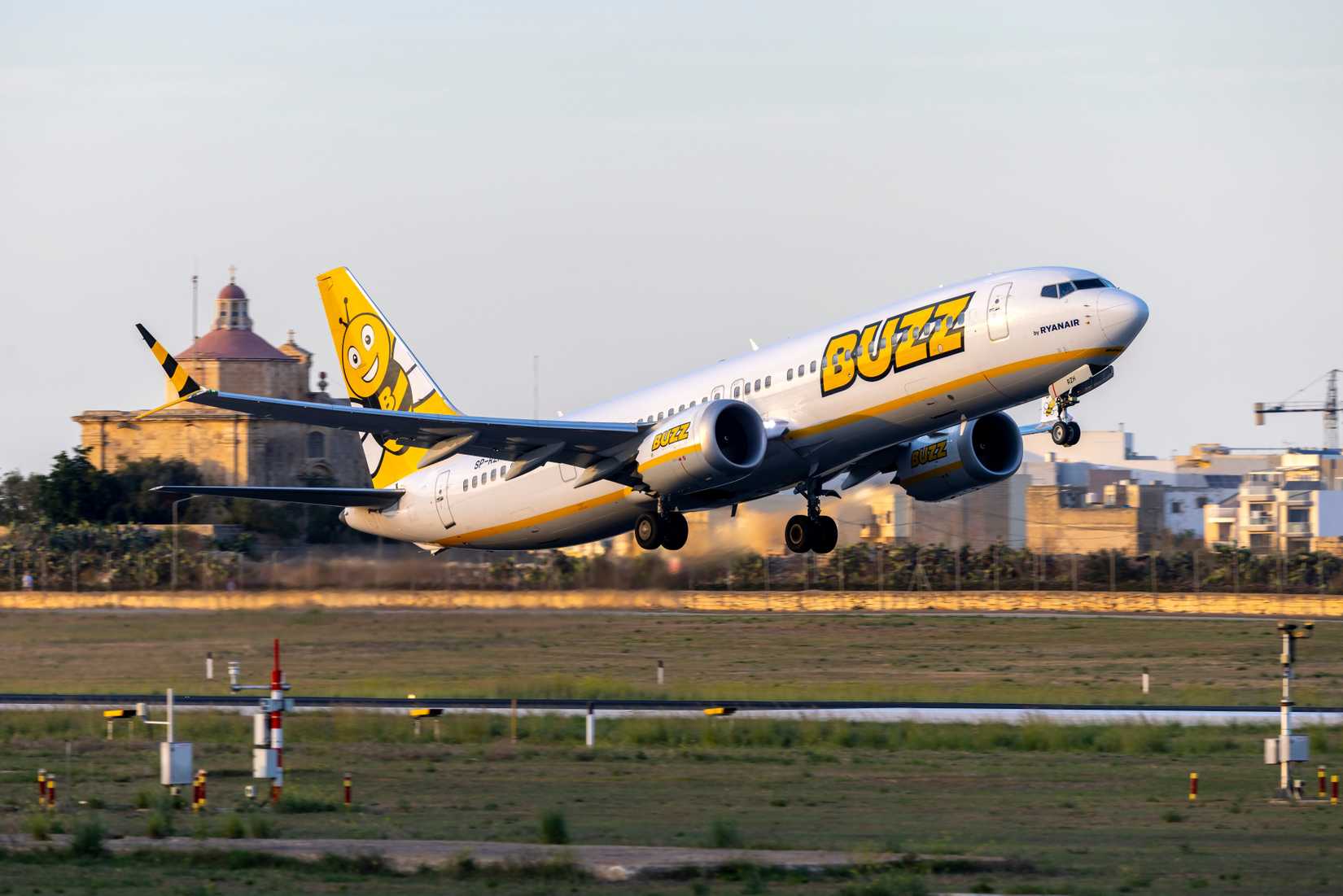 Buzz (Ryanair) Boeing 737-8 MAX 200 (REG SP-RZH) taking off from runway 13 late evening.