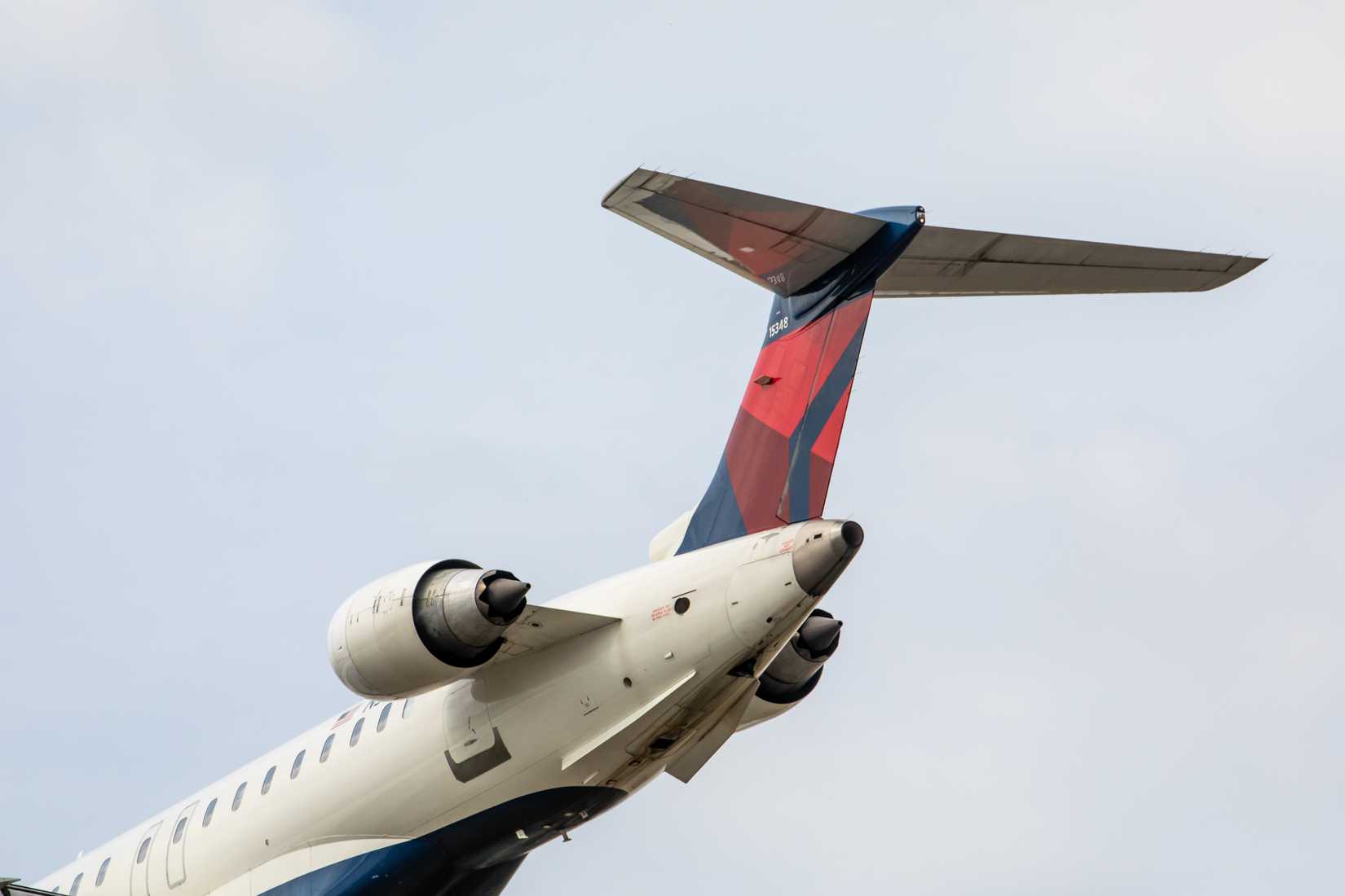Closeup of the tail of a Delta Connection Bombardier CRJ900.