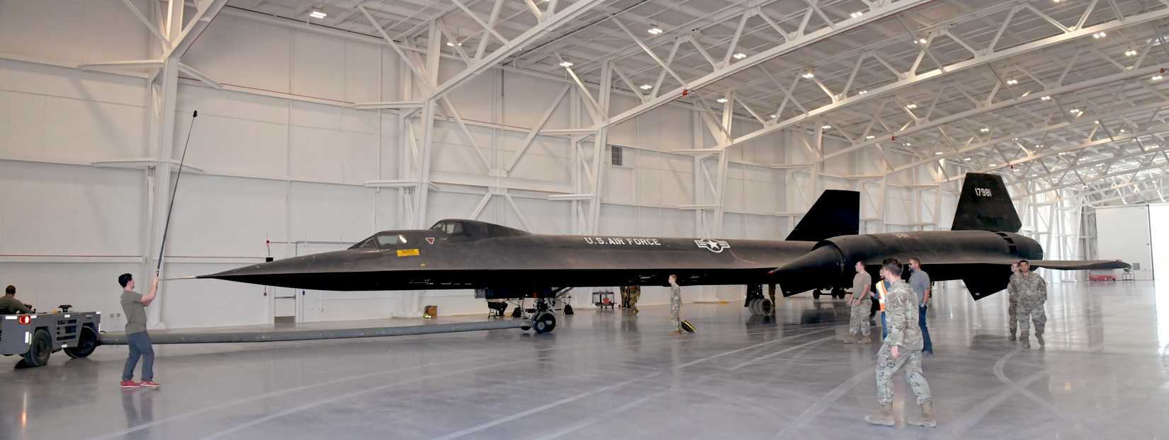Crews relocate an SR-71 Blackbird static display inside the Hill Aerospace Museum’s new L.S. Skaggs Gallery Oct. 23, 2023, at Hill Air Force Base, Utah.