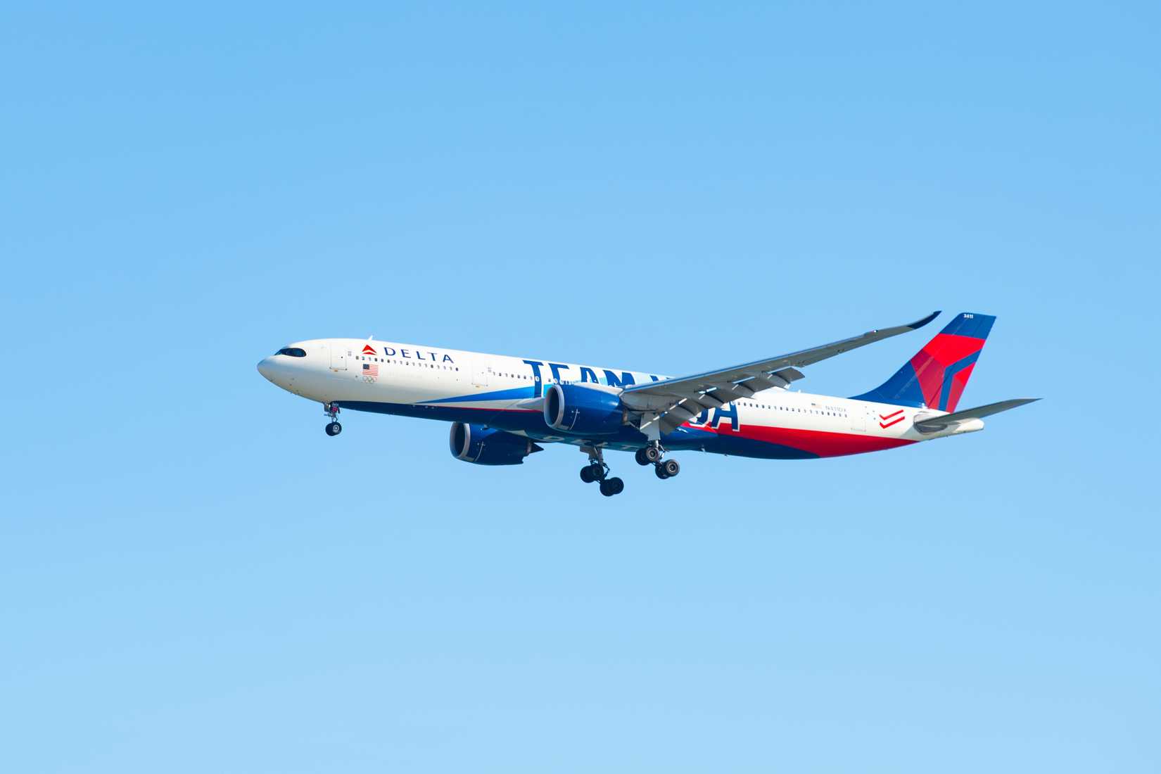 Delta Air Lines Airbus 330-900 neo N411DX with Team USA livery landing on Boston Logan International Airport, Boston