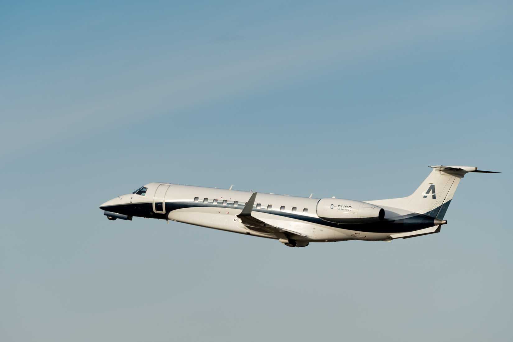 Embraer Legacy 650 aircraft is taking off from runway 28 during the world economic forum in Davos