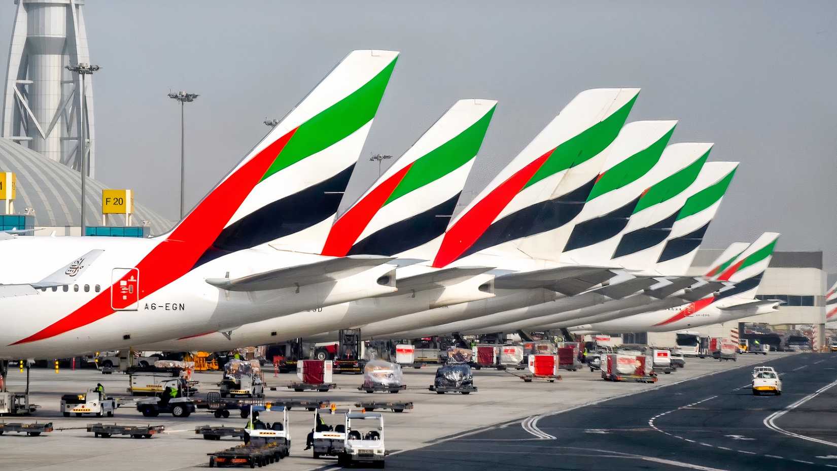 Emirates aircraft parked on stand at Dubai International Airport