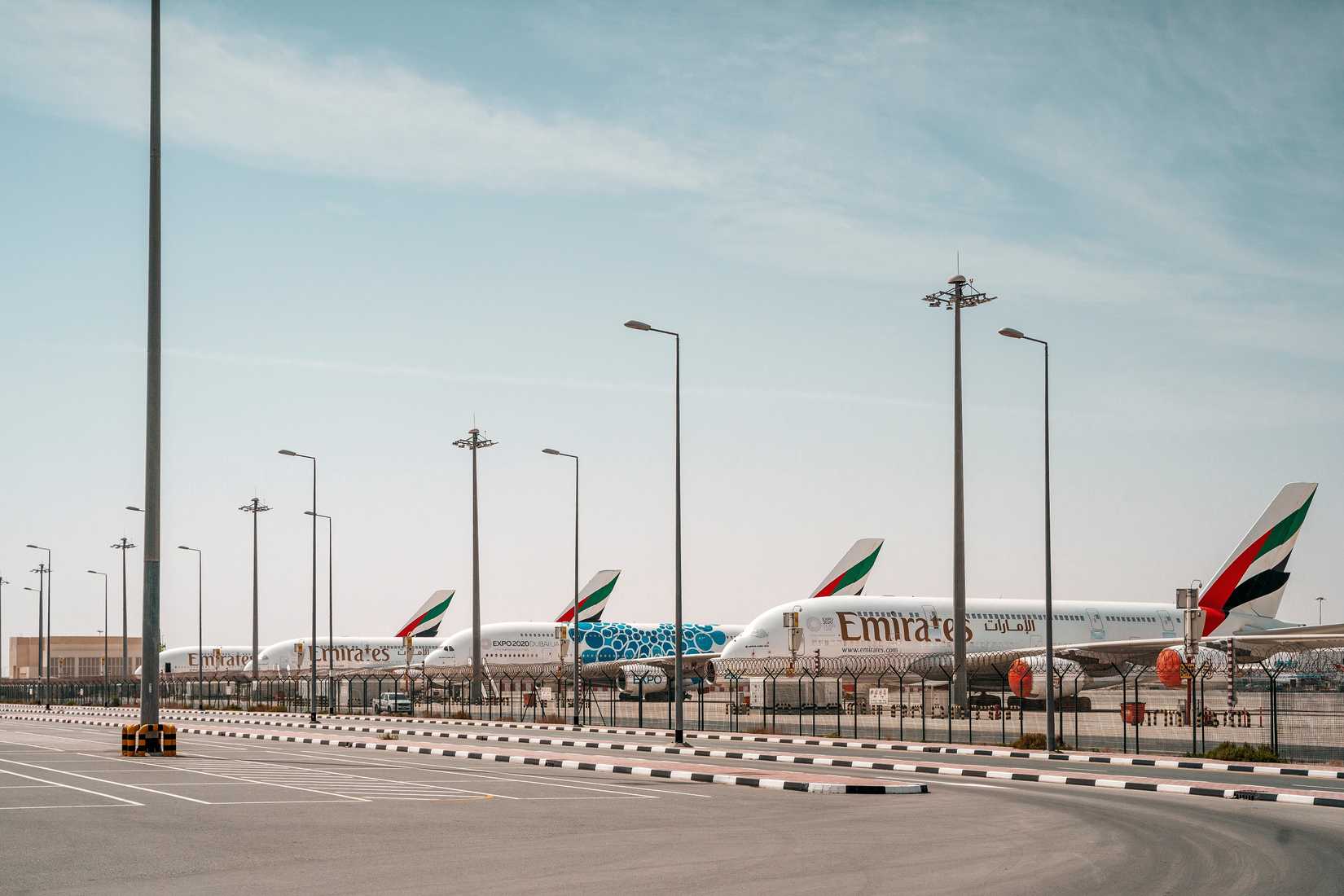 Emirates Airplanes in the airport parking Al maktoum.