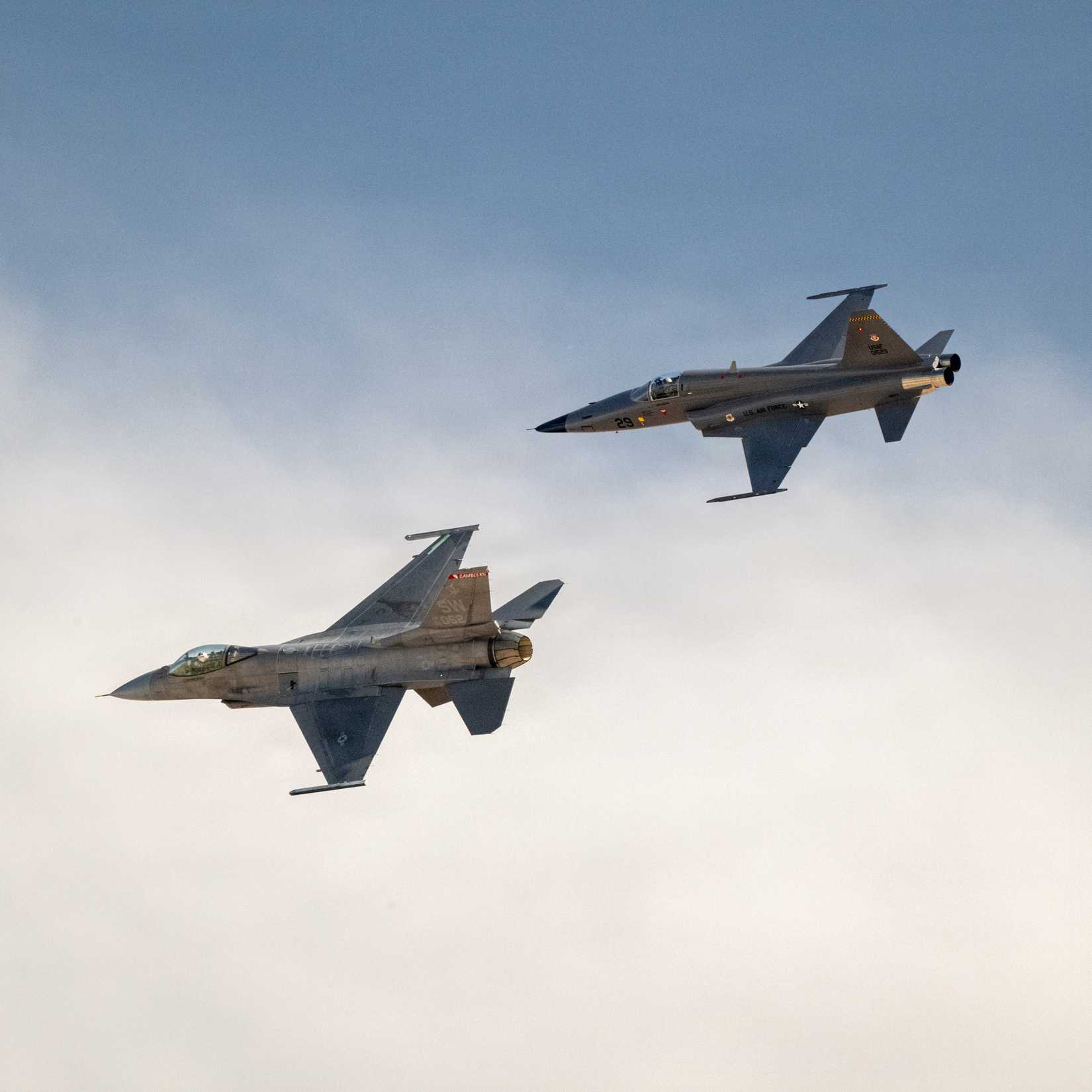 F-16 Viper Demonstration Team commander and pilot, flies a heritage formation alongside an F-5 Tiger