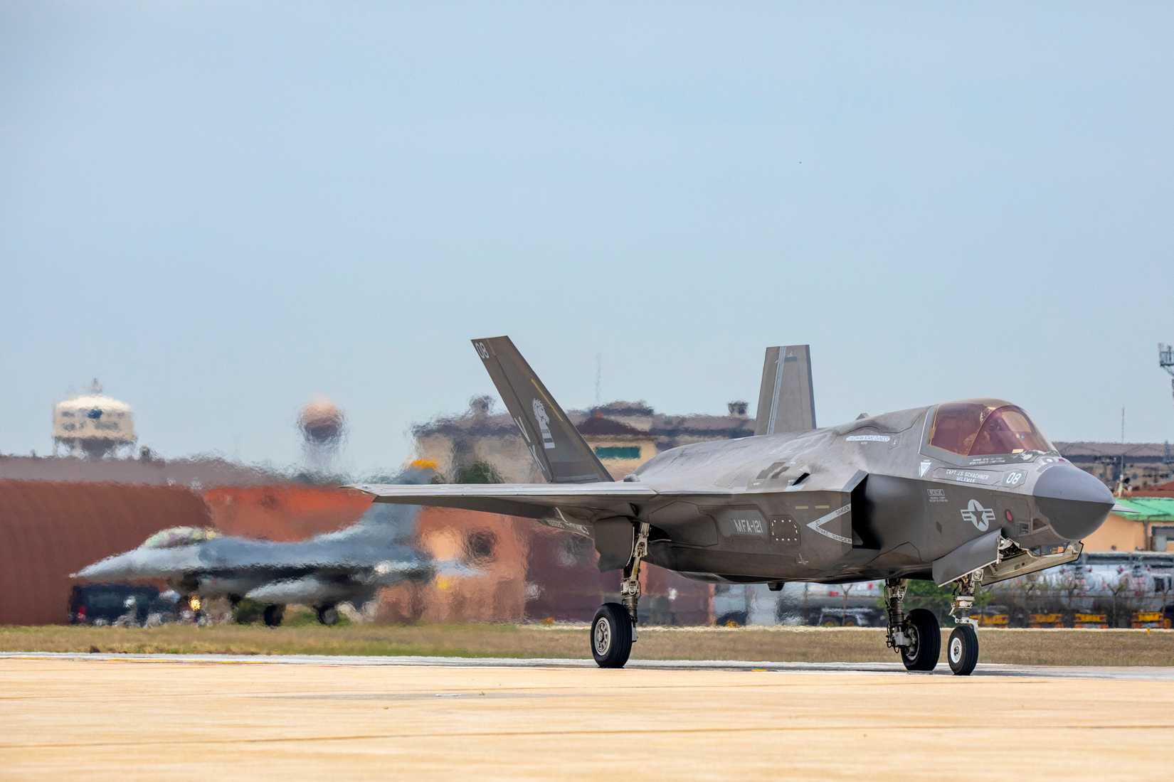 F-35B Lightning II aircraft with Marine Fighter Attack Squadron 121, Marine Aircraft Group 12, 1st Marine Aircraft Wing, and Air Force F-16 Fighting Falcon aircraft with the 8th Fighter Wing