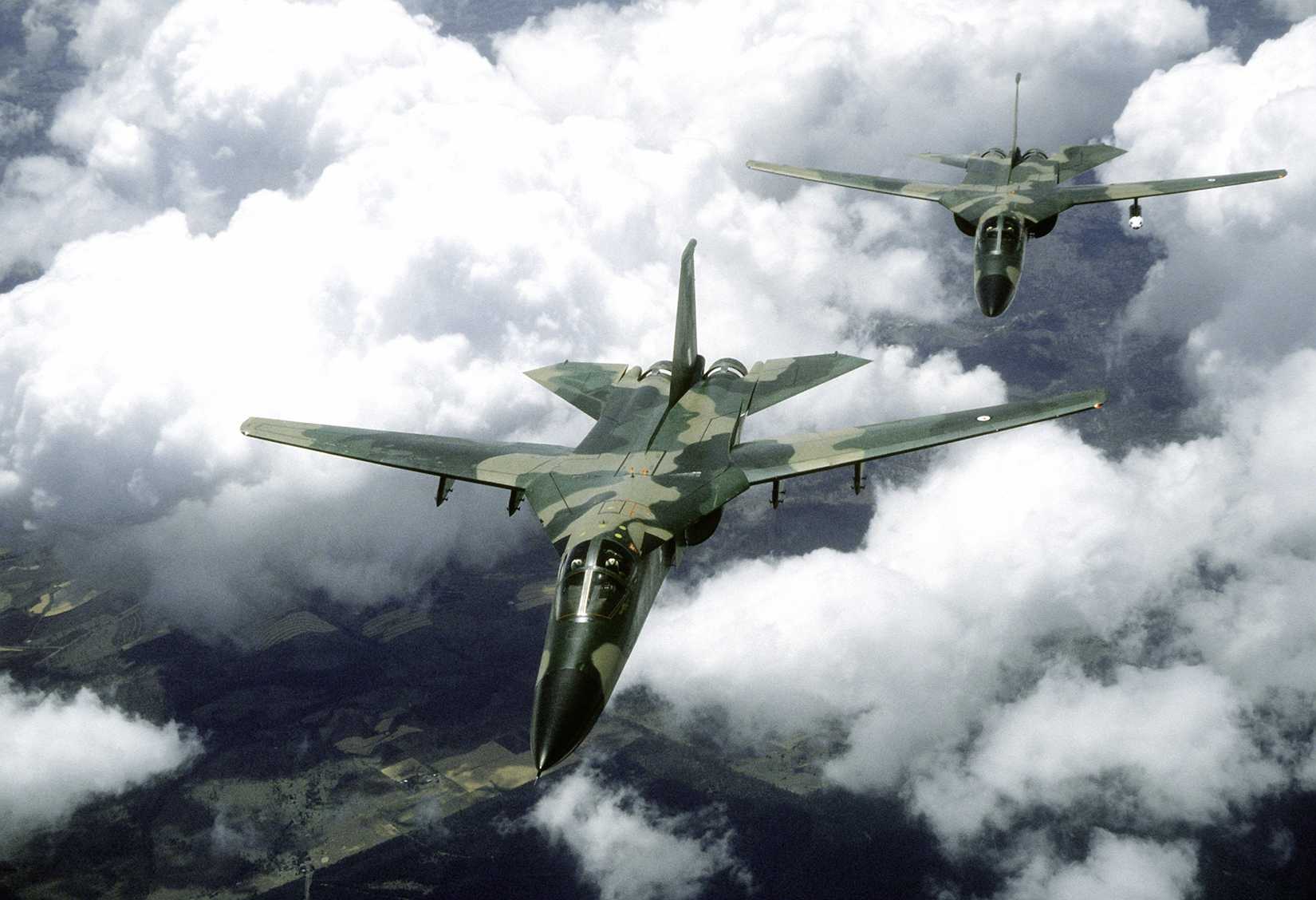 Front view of two Royal Australian Air Force F-111 aircraft in flight during exercise Kangaroo '81