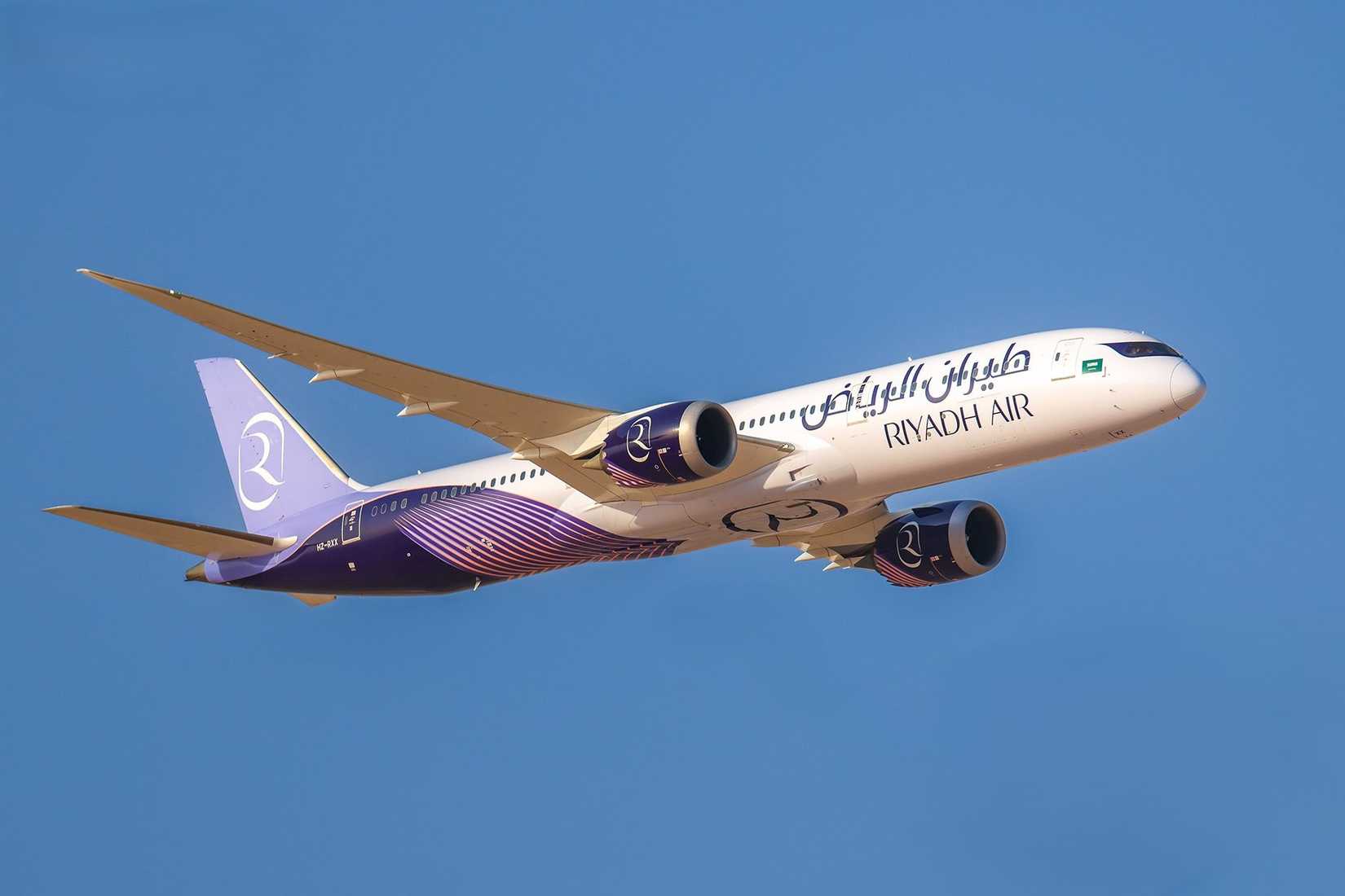 Riyadh Air 787 against a blue sky