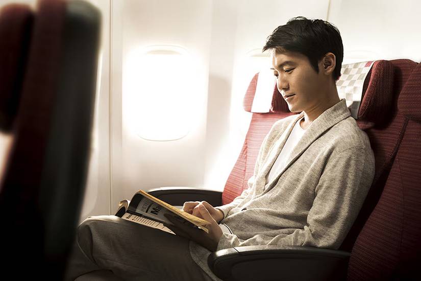 JAL seats with passenger in economy