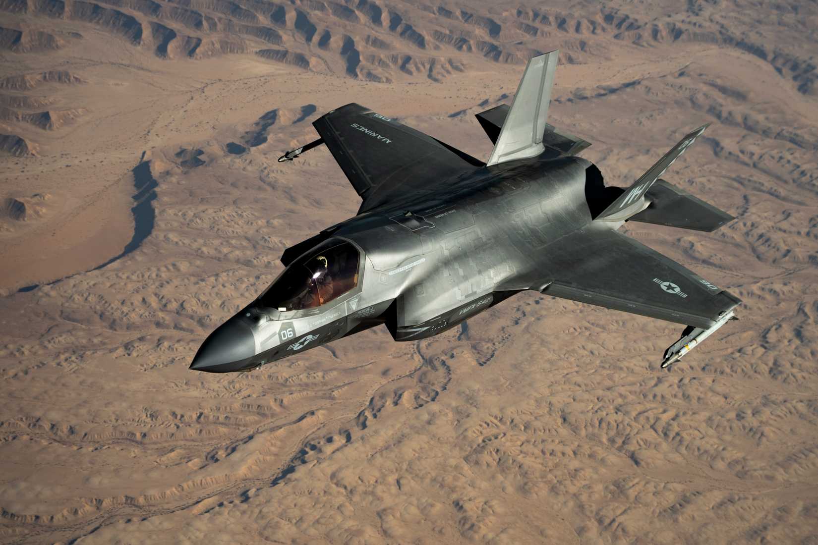 Marine Corps F-35B Lightning II approaches a U.S. Air Force KC-135 Stratotanker for aerial refueling.