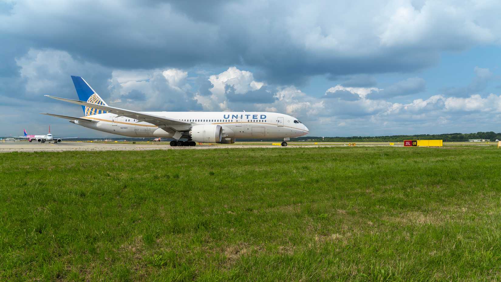 nited Airlines Boeing 787 Dreamliner aircraft is taxiing at MXP Milano Malpensa international airport.