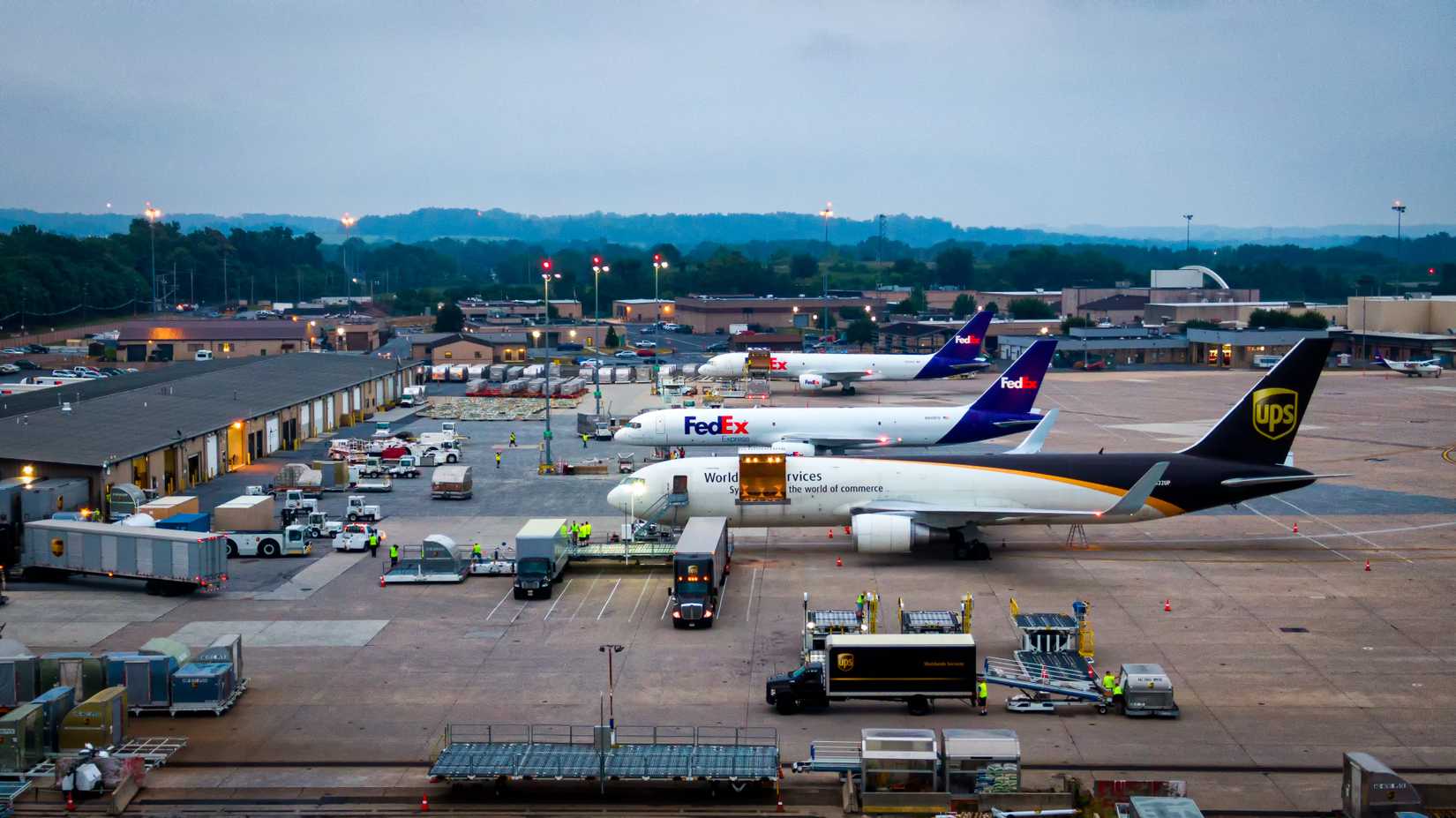UPS Airlines and FedEx Express aircraft parked parallel