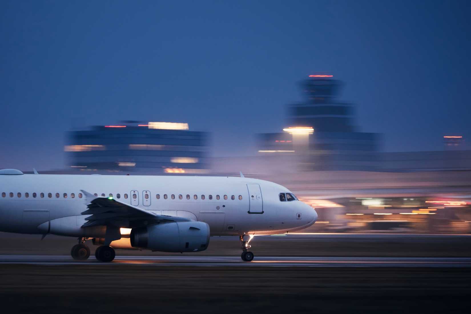 aircraft taking off at nighttime