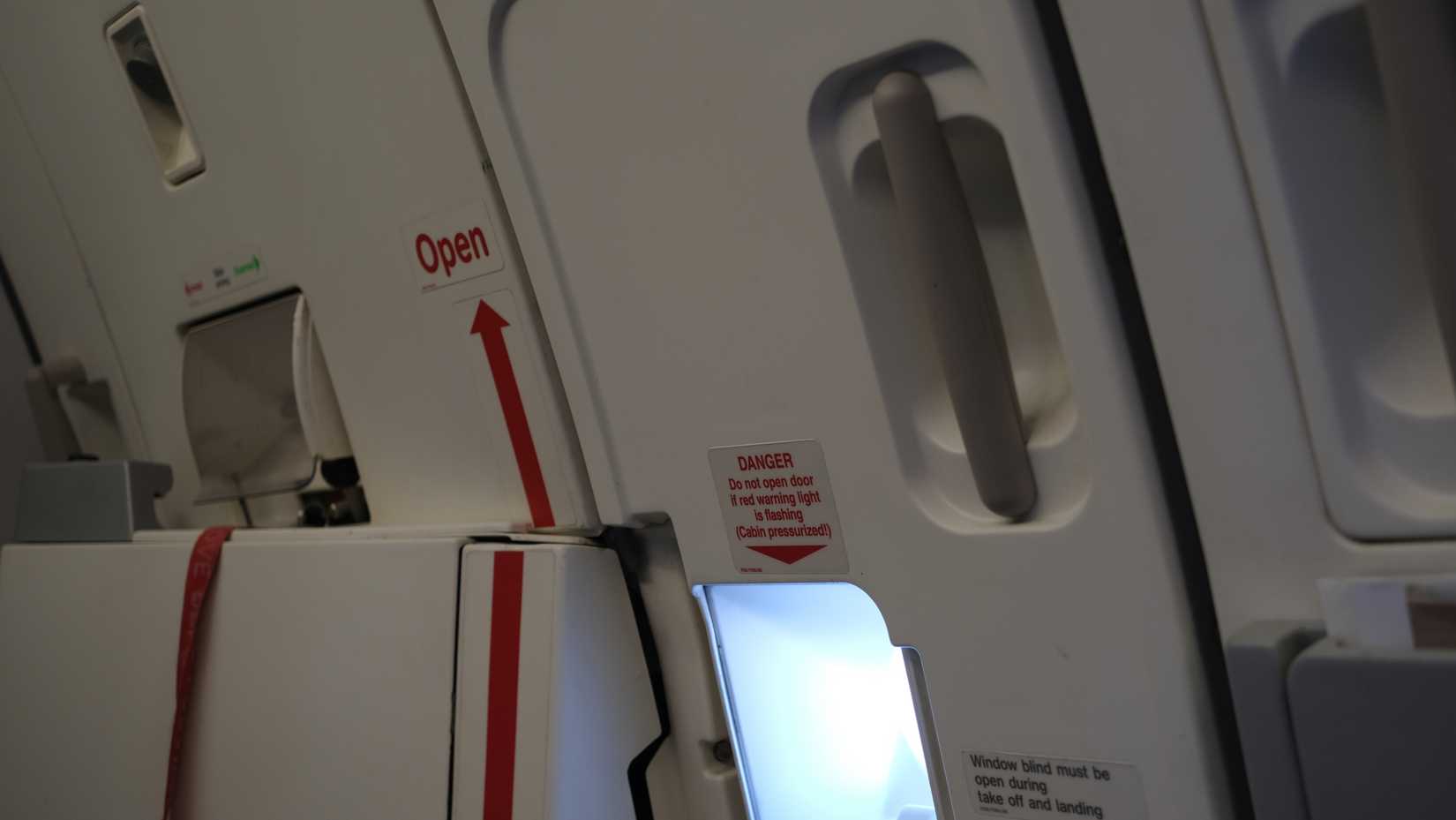 Airplane emergency exit door