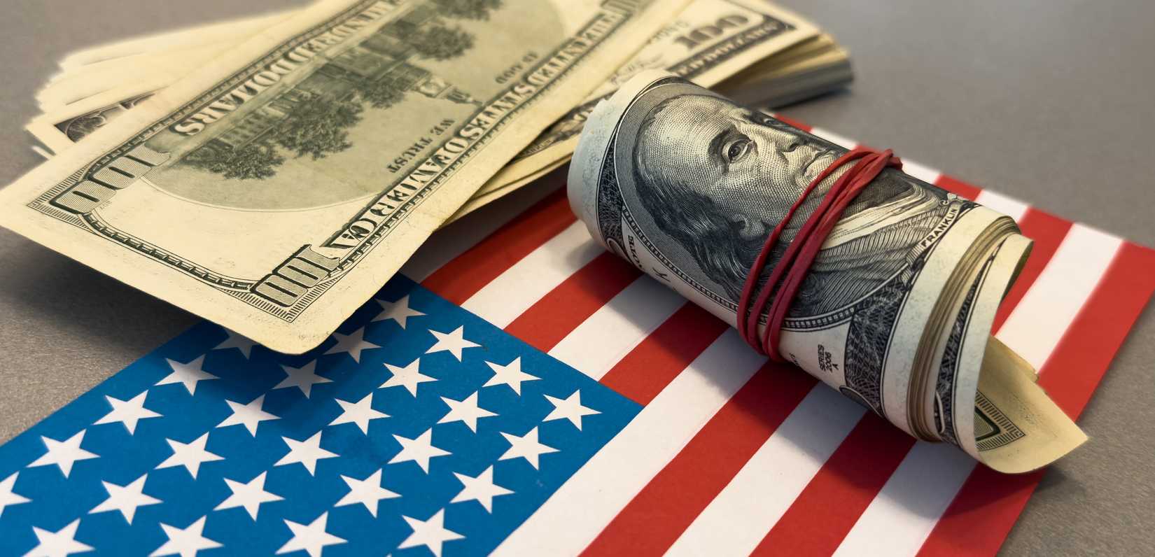 business crisis finance dollar concept. close-up of a usd hand counting paper dollars