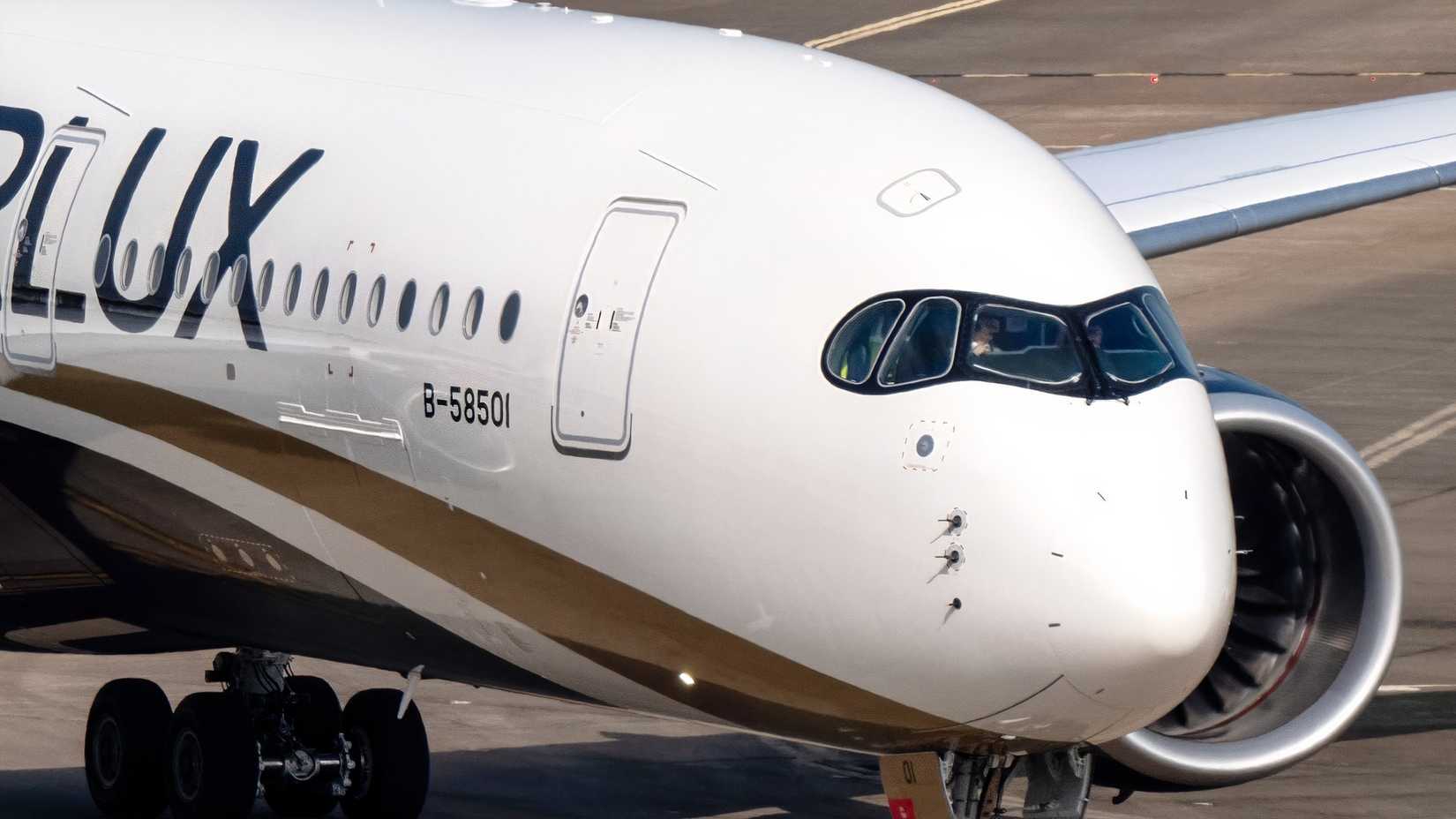 STARLUX Airbus A350-900 taxiing towards a runway