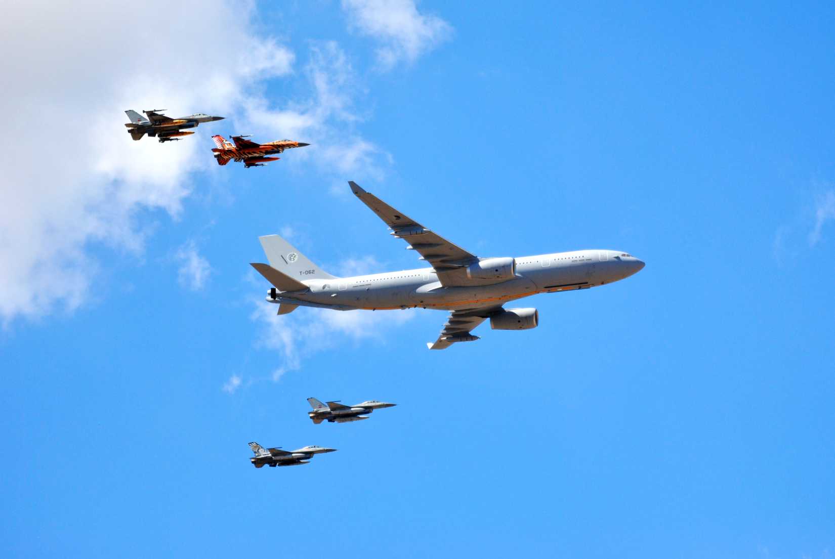 Royal Netherlands Air and Space Force Airbus A330 MRTT in formation with Portuguese Air Force F-16s at NATO Tiger Meet 2025, Beja.