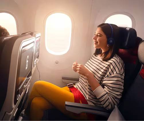 Turkish Airlines woman seated in economy class