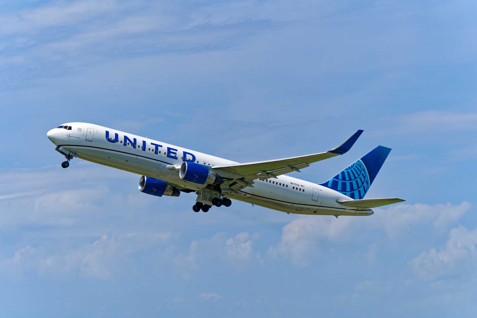United Airlines Boeing 767-300 N675UA airplane taking off from Swiss airport Zürich Kloten.