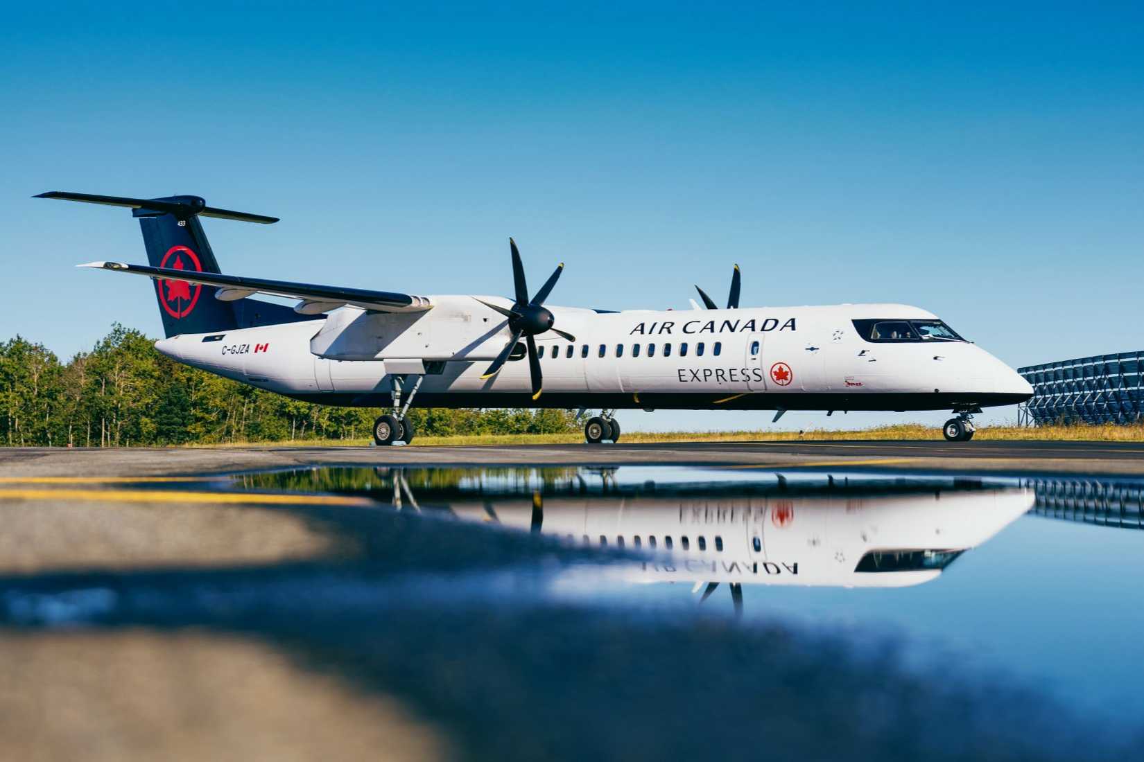 Air Canada Express Dash 8 with reflection