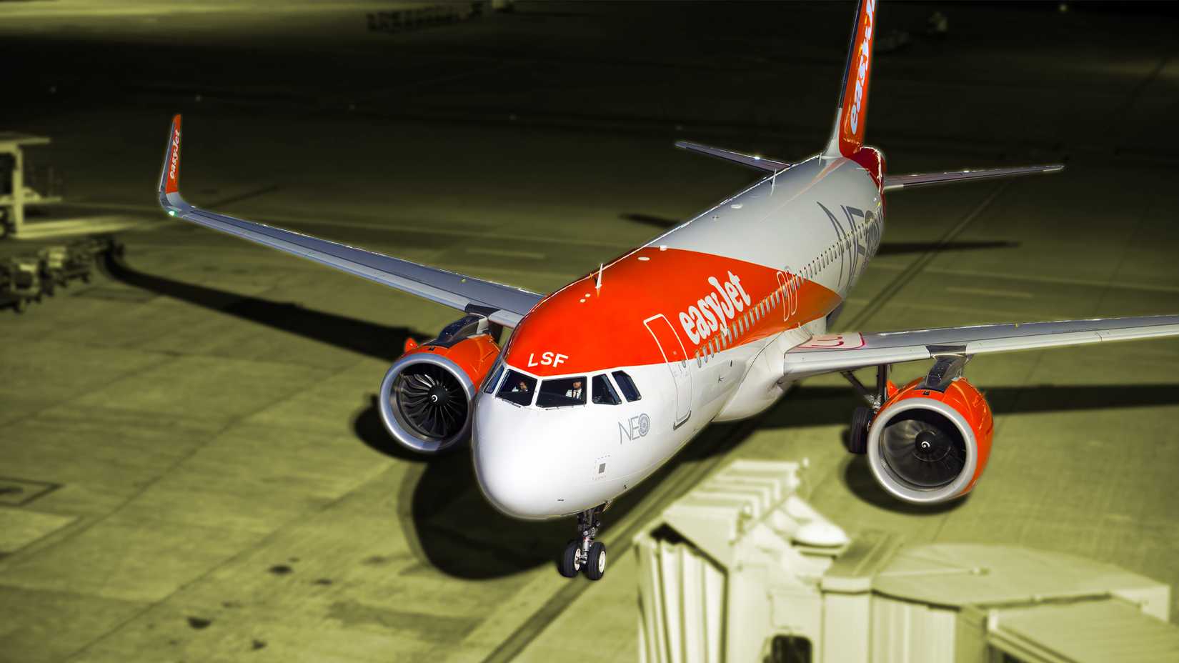 An Airbus A320neo Operated By EasyJet Sitting At The Gate