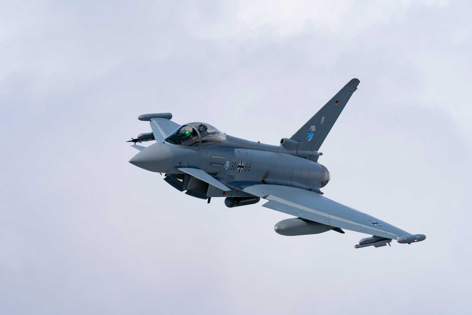 A German Air Force Eurofighter Typhoon flies over Alaska during exercise Arctic Defender 24.