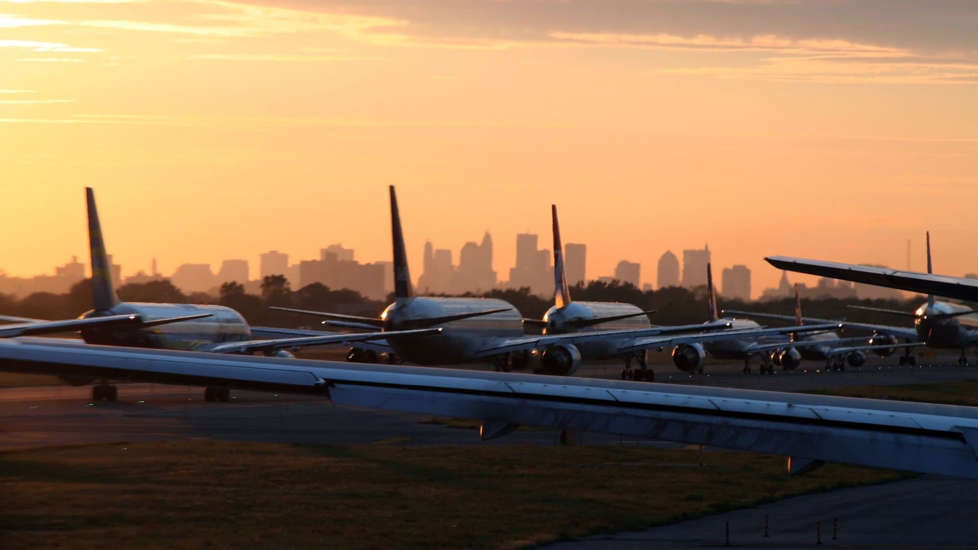 A Line Of Aircraft Waiting To Take Off At JFK Airport
