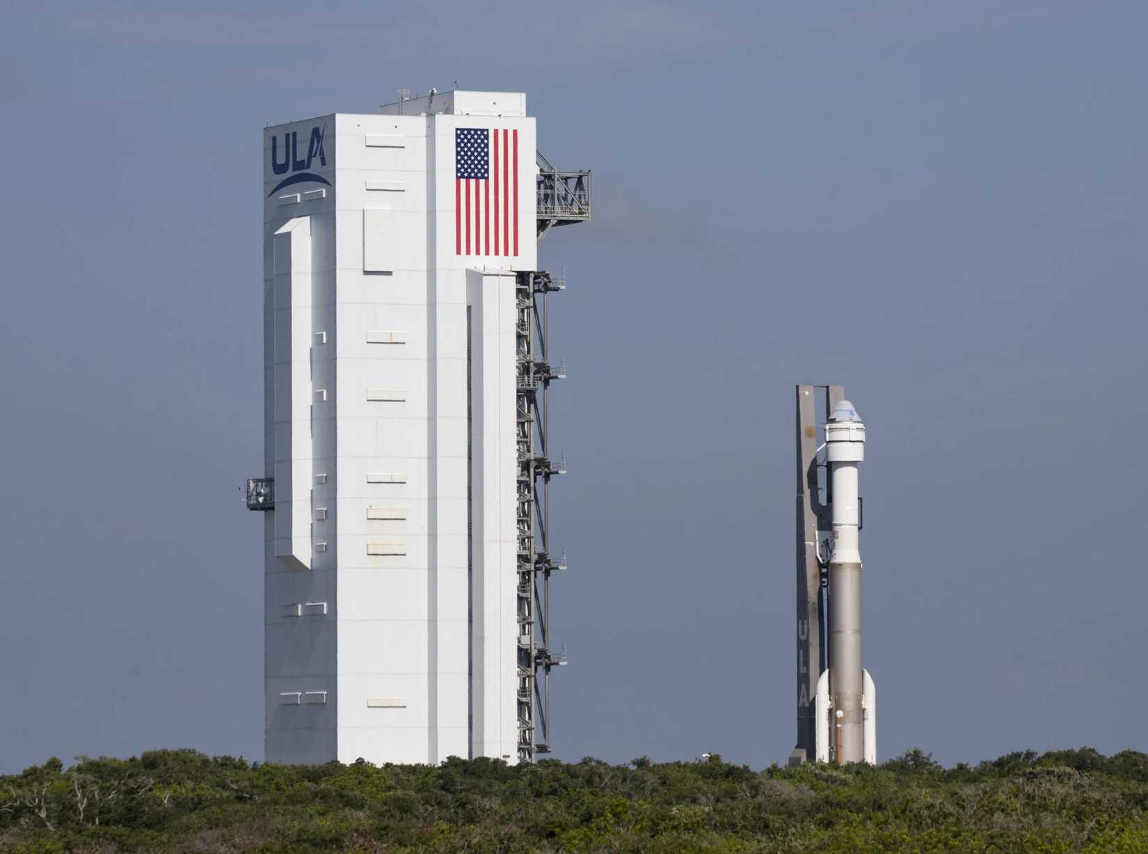 A United Launch Alliance Atlas V rocket with Boeing’s CST-100 Starliner spacecraft onboard is seen near the Vertical Integration Facility at Cape Canaveral Space Force Station in Florida.