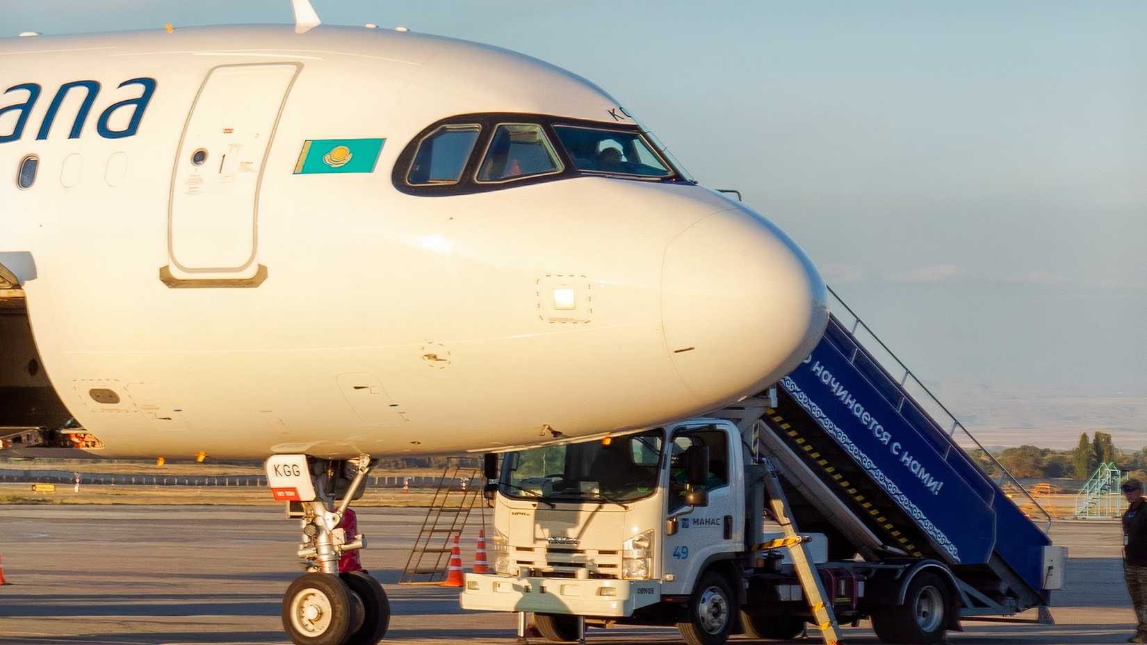 Air Astana Airbus A321LR on the ground being turned around ahead of its next flight
