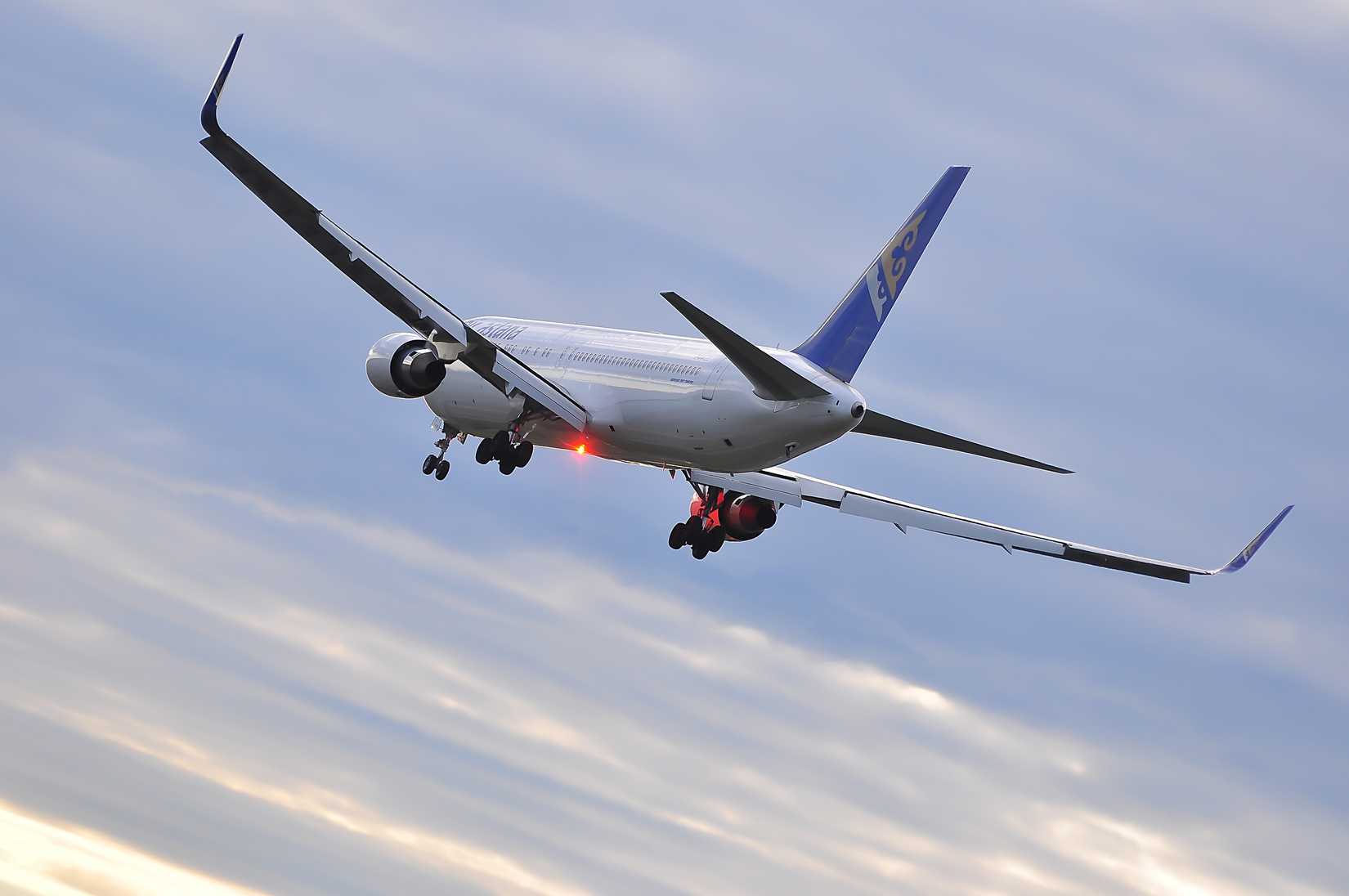 Air Astana Boeing 767 over airport on September 4,2015 in Frankfurt,Germany.