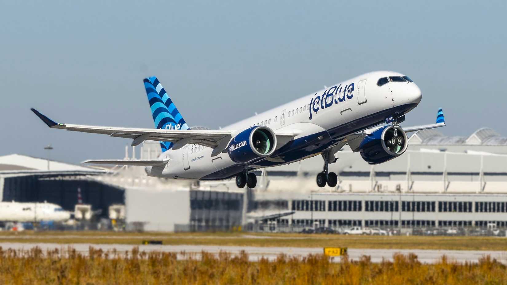 JetBlue Airbus A220 taking off
