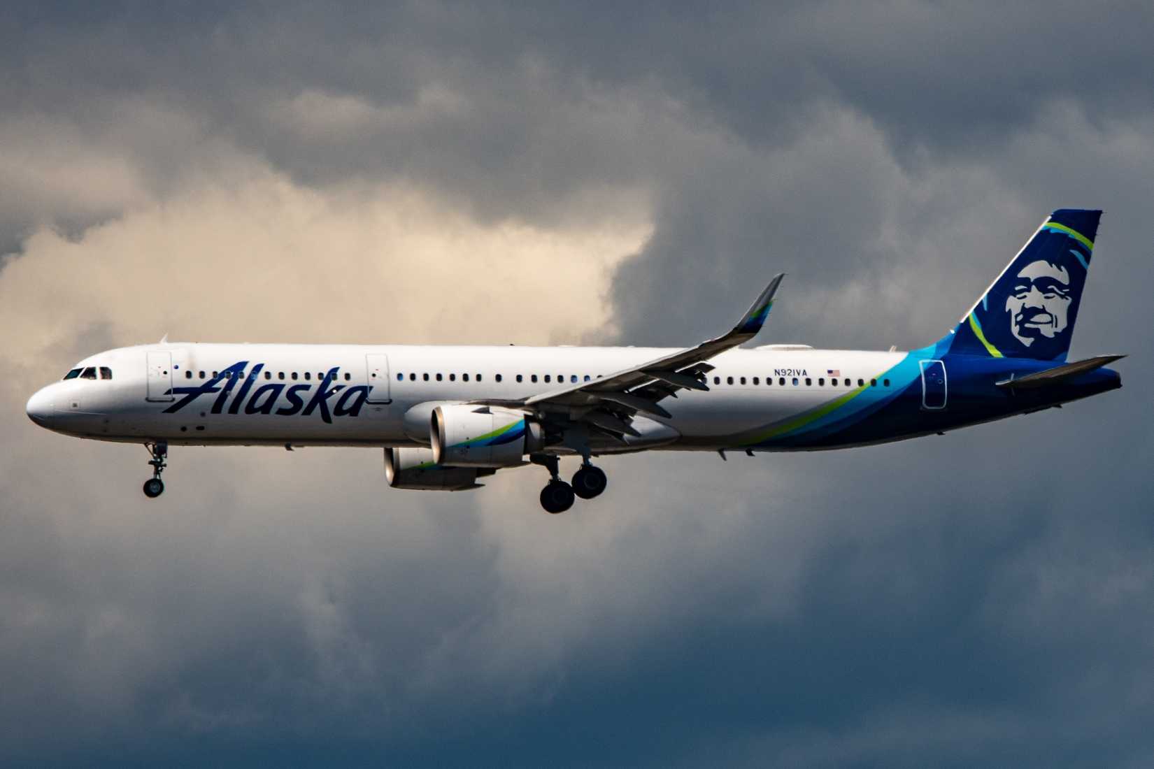 Alaska Airlines A321neo Landing Against SEA Clouds