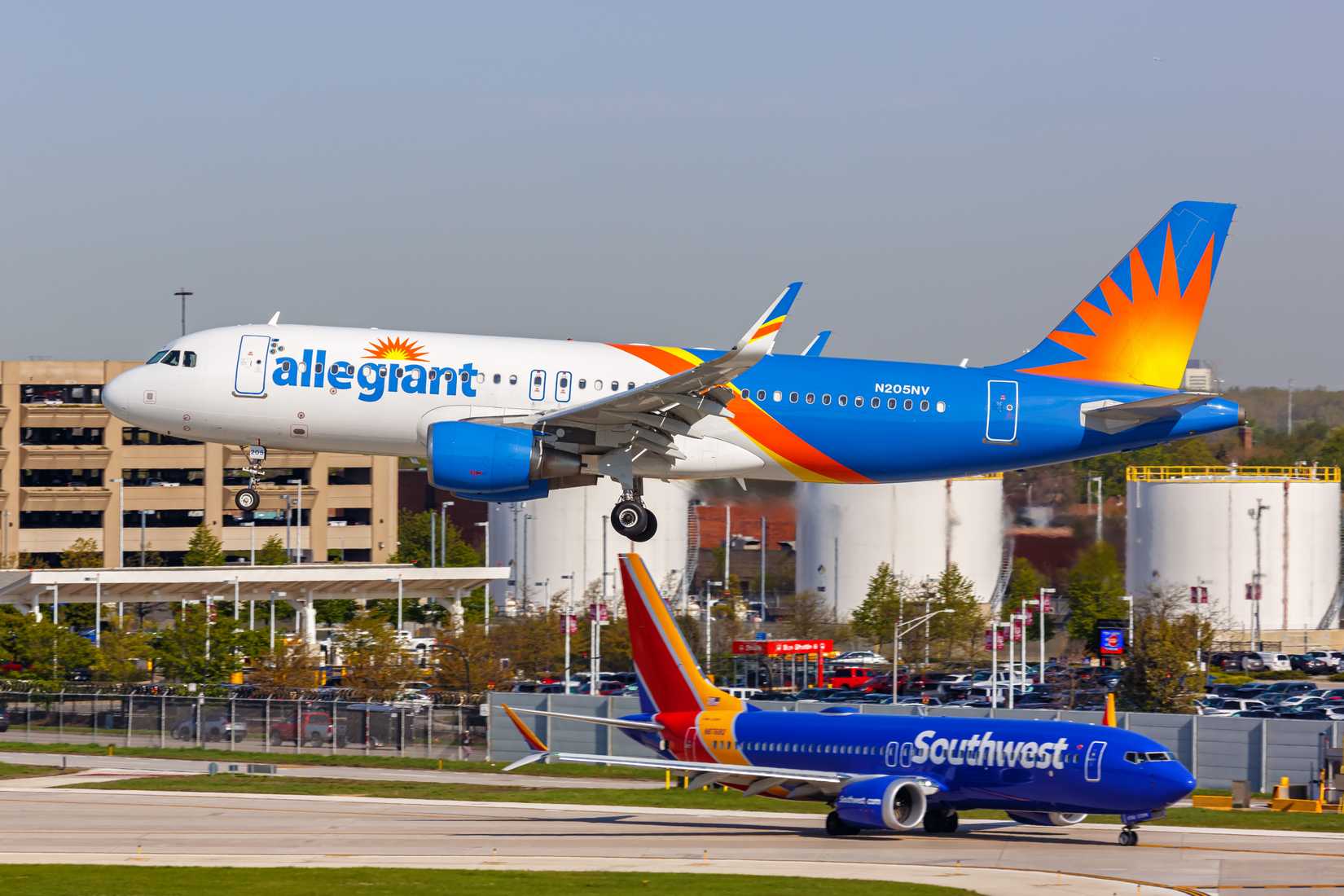 Allegiant Air and Southwest Airlines Airbus and Boeing airplanes at Chicago Midway Airport (MDW).