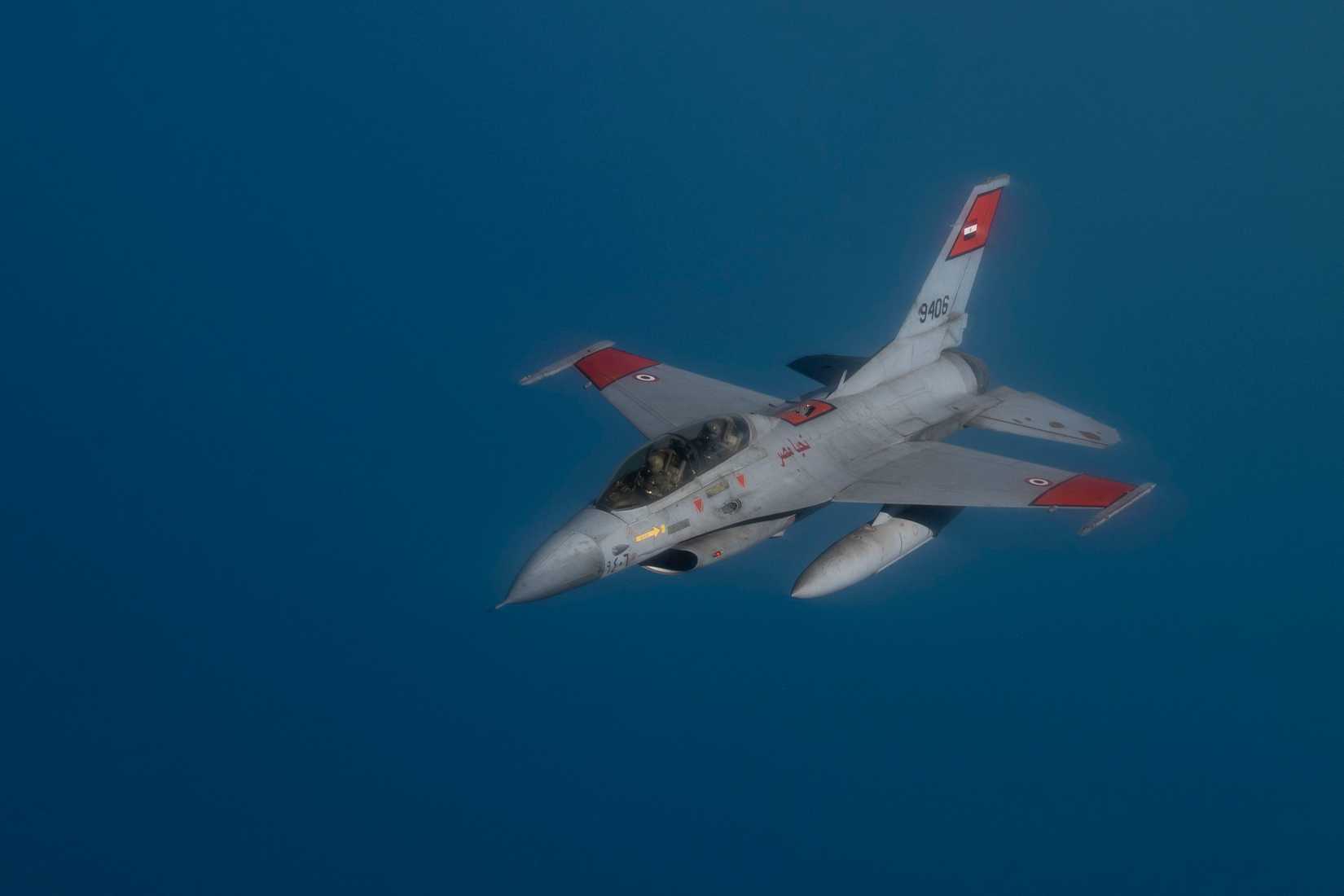 An Egyptian F-16 Fighting Falcon departs after refueling from a USAF KC-135 Stratotanker.