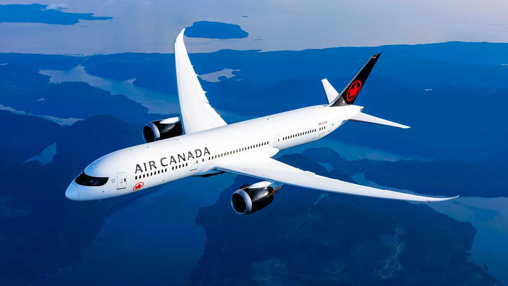 Air Canada Boeing 787-9 over lakes