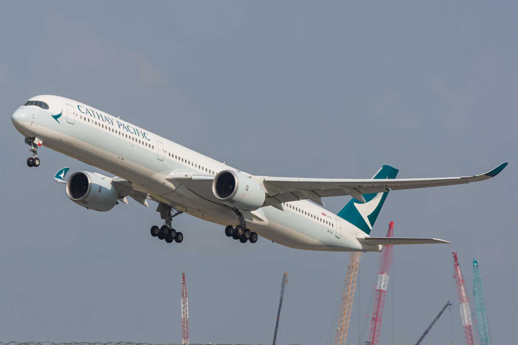 Cathay Pacific Airbus A350-1000 is taking off from Bangkok Suvarnabhumi International Airport.