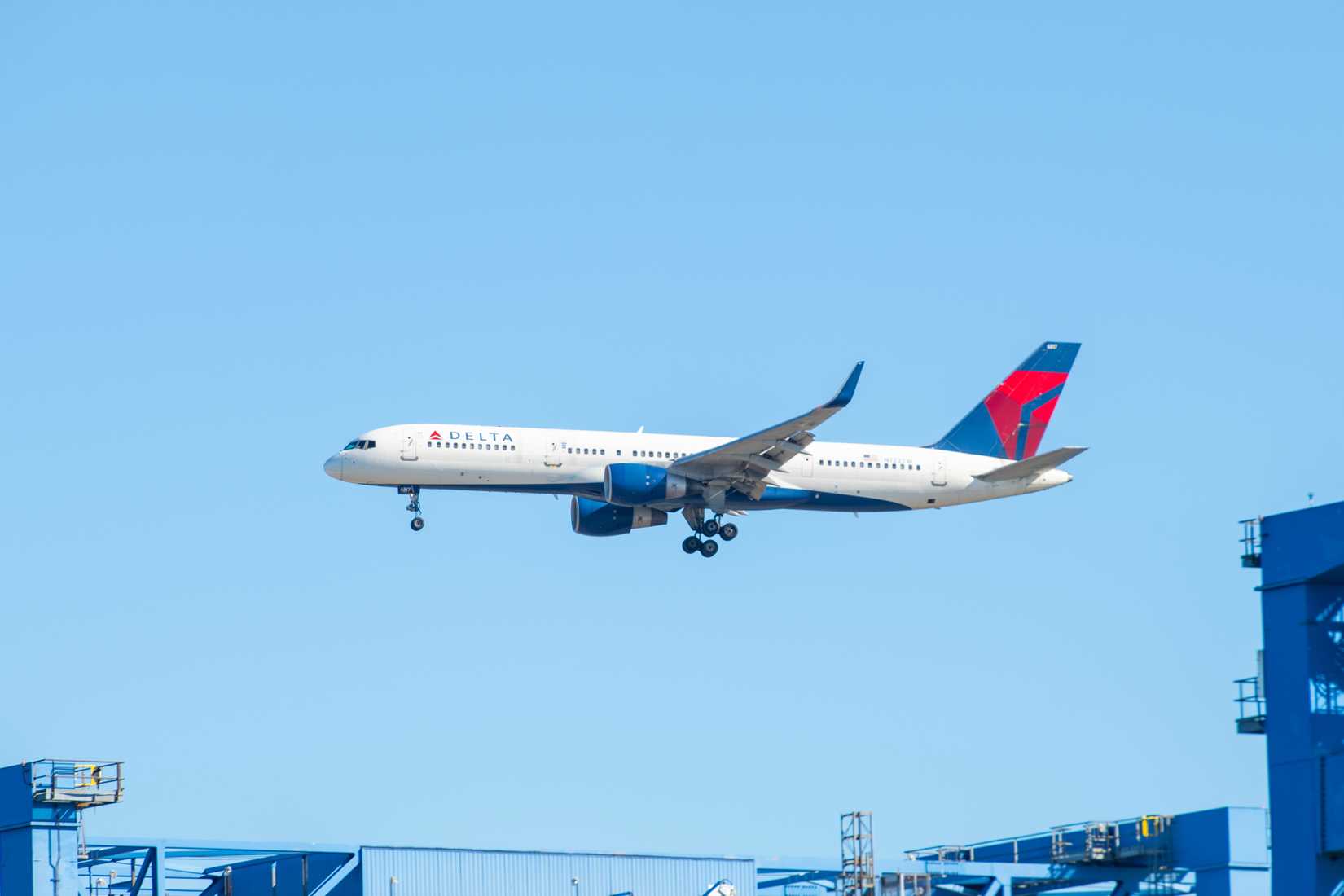 Delta Air Lines Boeing 757-200 N273TW landing on Boston Logan International Airport, Boston, Massachusetts.