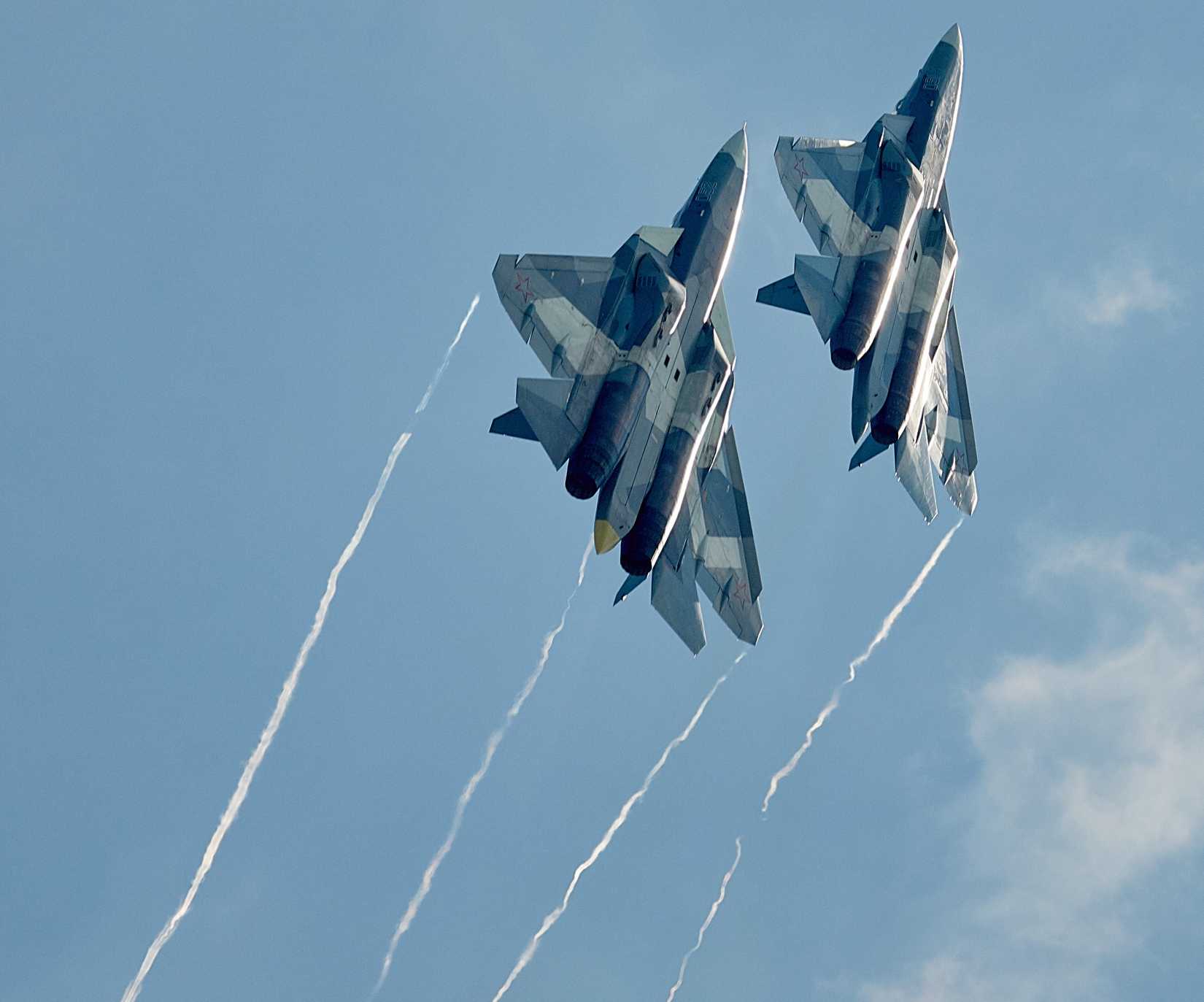 Fighter Su-57 (Sukhoi T-50 PAK-FA) fifth generation airplane performing demonstration flight during MAKS-2017 airshow.