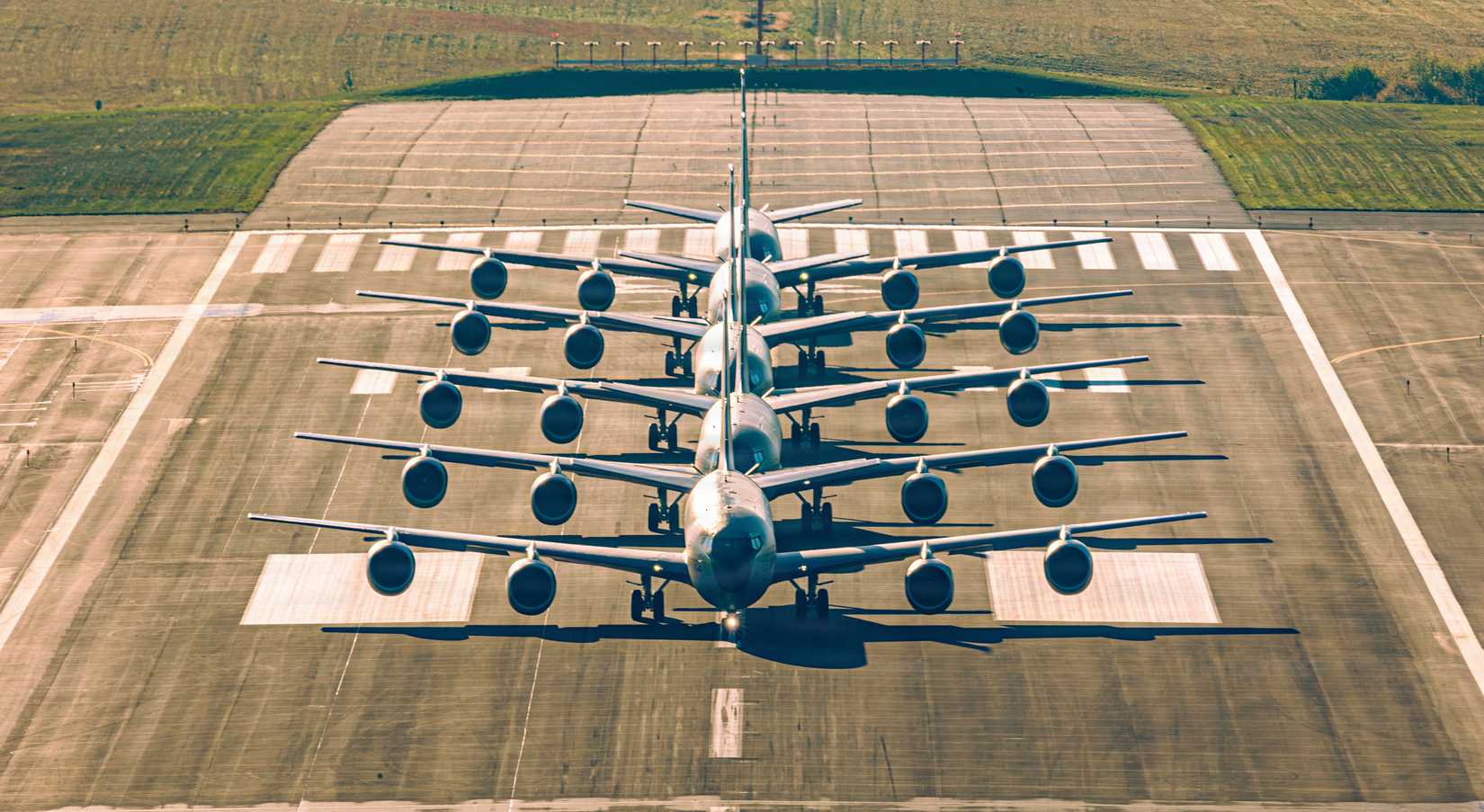 Five KC-135 Stratotankers assigned to the 101st Air Refueling Wing line up before a comprehensive formation training sortie at the Bangor Air National Guard Base.